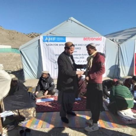 Zakhim khan receiving cash for winterization.