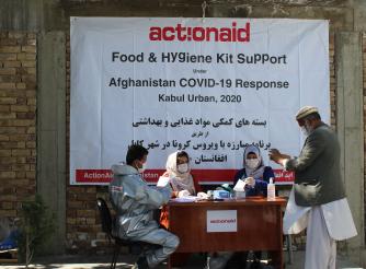 ActionAid Staff and volunteer Prepare for Distribution 